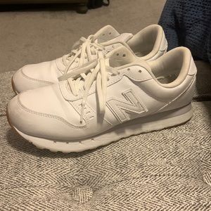 311 New Balance Sneakers